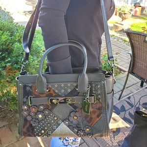 Never used coach  Rogue  all real leather all new!!!